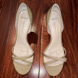 Really nice tan colored open toe heels.